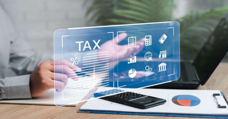 Financial research, government taxes and calculation tax return concept, Businessman pointing on tax document digital fill in the income tax online return form for payment on internet