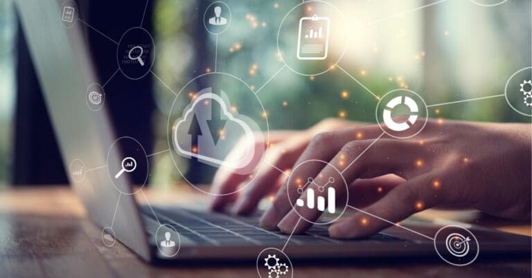 Laptop with various interconnected icons overlayed, depicting finance automation